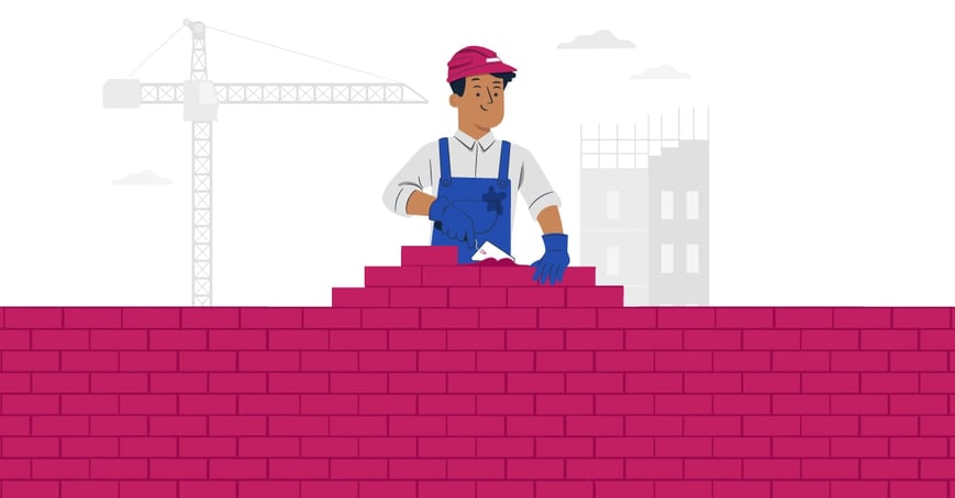 Cartoon caricature laying pink bricks in front of a city skyline